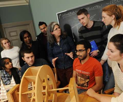 Students listening in a classroom.